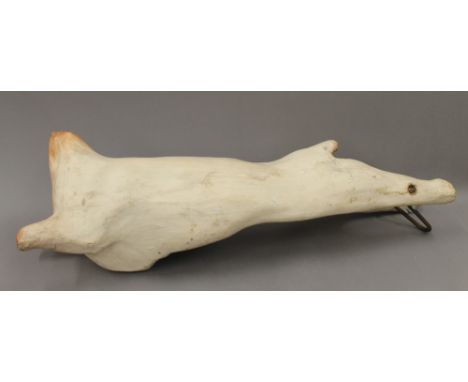 A vintage butchers shop hanging pig model. 93 cm long.