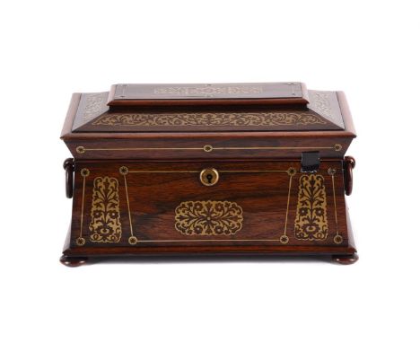 Y&amp;nbspA WILLIAM IV ROSEWOOD AND BRASS INLAID TEA CADDY  CIRCA 1835 Of sarcophagus form, the lid enclosing a pair of subsi