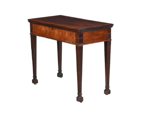 A GEORGE III MAHOGANY FOLDING GAMES TABLE  LATE 18TH CENTURY  The folding top opening to a baize playing surface and with hid