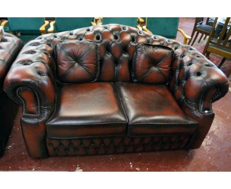 Good quality button back leather 2 seater sofa with cushions