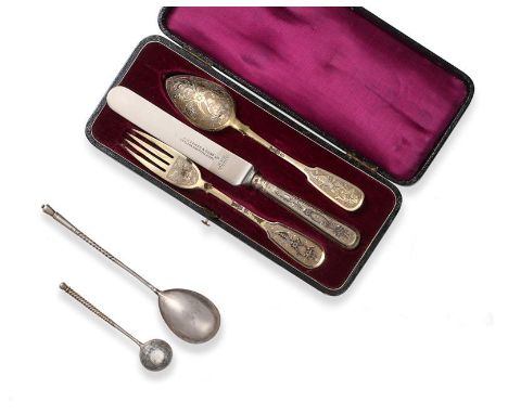 A Three-Piece Russian Silver-Gilt Knife, Fork and Spoon, Moscow, 1878, Fiddle pattern, engraved with foliage and flowers on a