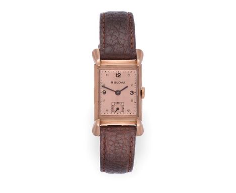 A 14 Carat Gold Rectangular Shaped Wristwatch, signed Bulova, circa 1950, (calibre 7AK) lever movement signed, light pink col
