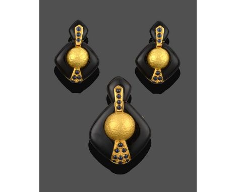 A Black Enamel and Sapphire Brooch/Pendant and Earring Suite, a pentagon shaped black enamel plaque suspends a larger kite-sh