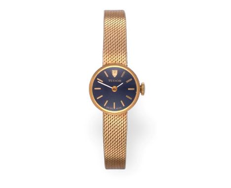 A Lady's 9 Carat Gold Wristwatch, signed Tudor, circa 1970, lever movement signed, dark blue coloured dial with baton markers