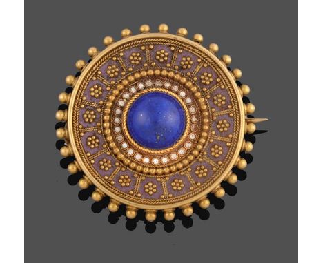 A Victorian Lapis Lazuli and Enamel Brooch, of circular form, the central round cabochon lapis lazuli within a yellow ropetwi