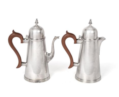 An Elizabeth II Silver Coffee-Pot and Hot-Water Jug, by J. B. Chatterley and Sons Ltd., Birmingham, 1967, each in the George 