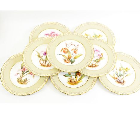 A Spode part dessert service, Orchid design, each printed and painted with s specimen plant, signed J Price, Y 6388, 23cm dia