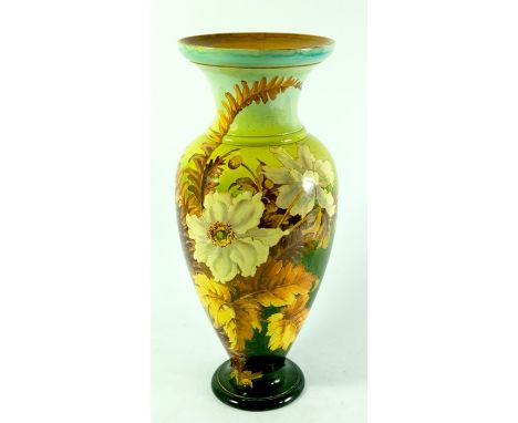 Doulton Lambeth Faience vase, monogrammed F L and A M, baluster form, circa 1885, decorated with flowers and leaves on a grad