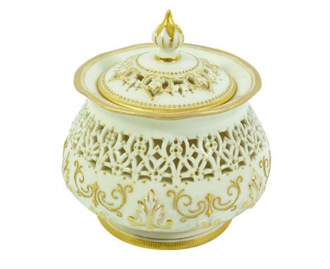 George Owen for Royal Worcester, a reticulated potpourri pot and cover, 1911, squat baluster form with relief moulded acanthu