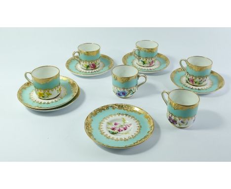 A set of six Copeland Spode coffee cups and saucers, each painted with floral specimens below a turquoise blue band, with gil