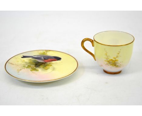 Ernest Barker for Royal Worcester, a cabinet coffee cup and saucer, painted with a Bullfinch to each, 1938, pattern number 27