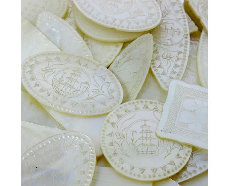 A collection of Chinese mother of pearl gaming counters, 18th century or later, including art sets of circular, oval lozenges