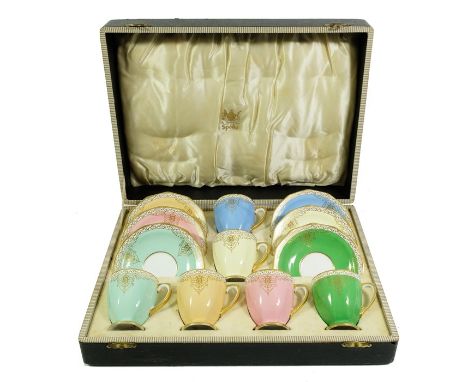 A Copeland Spode harlequin coffee set, cased, pastel and gilt cups and saucers, in fitted box