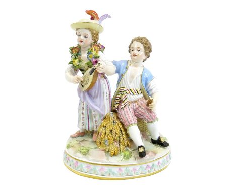 A Meissen figure group, Summer, 19th century, modelled as children with wheat and floral garland, playing the lute, incised G