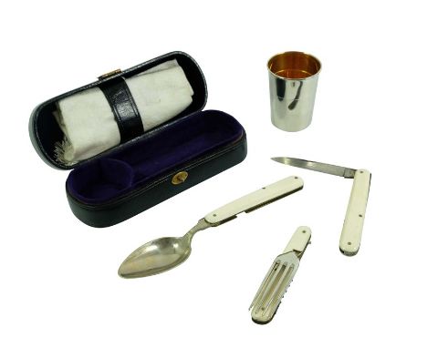A 19th century Couvert de Voyage travelling set, including bone handled folding spoon, fork and knife, gilt lined concertina 