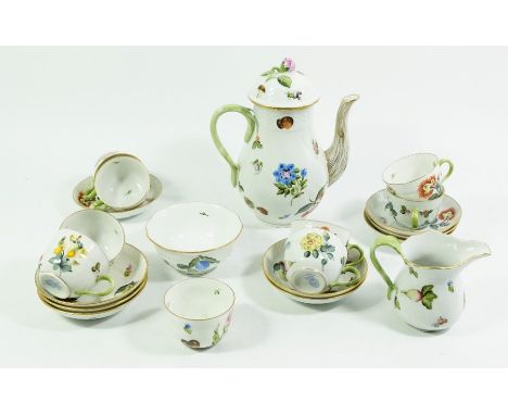 A Herend coffee set of nine cups and saucers, coffee pot, jug and bowl, painted with floral and vegetable specimens, relief m