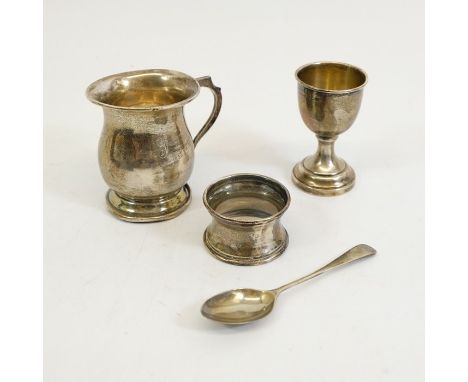 A George V silver christening set, S Blackensee and Son Ltd., Birmingham 1931, including mug, egg cup, spoon and napkin ring,