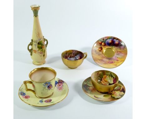 E Townsend for Royal Worcester, a fruit painted cup and saucer, together with a rose painted cup and saucer and another, and 
