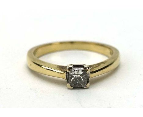 An 18ct yellow gold ring set single princess cut diamond in a four claw setting, stone approximately 0.26 carats, ring size K