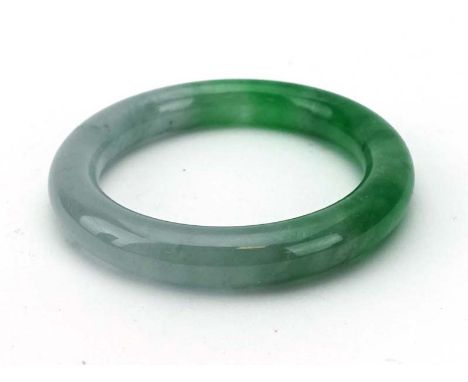 A pale green jade bangle, internal d. 5.5 cm