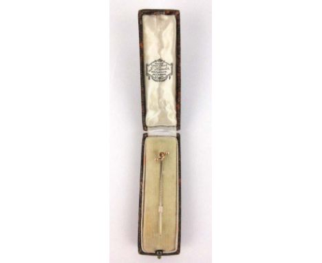 A Victorian 9ct gold stick pin with baton twist design in fitted box. Approx weight 1.2g