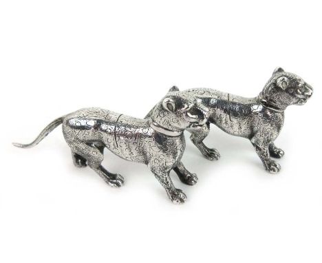 A pair of Edwardian novelty silver place holders in the form of leopards with collars engraved '28th May 1908'. Hallmarked fo