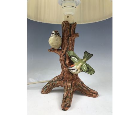 A Goebel figural table lamp, naturalistically modelled and incorporating a pair of goldcrest birds 