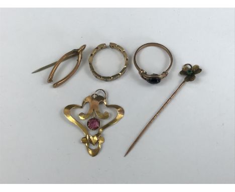 Yellow-metal jewellery, including an Art Nouveau openwork pendant, stamped 9ct, a wishbone brooch, stamped 9ct, (a/f), a yell