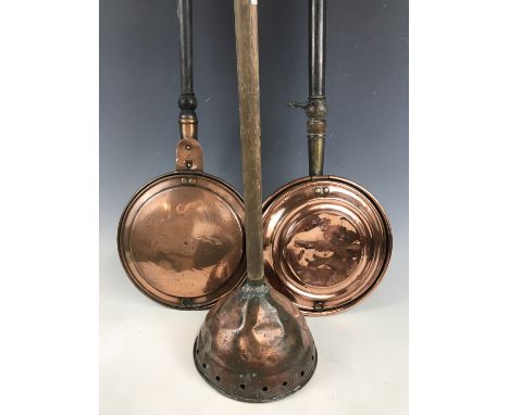 Two 19th Century bed warming pans together with a poss stick