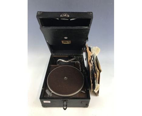 An early 20th century His Masters Voice portable gramophone record player together with a quantity of records