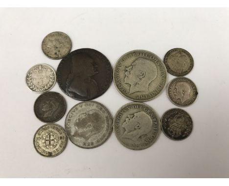 A 1792 John Wilkinson, Iron Master copper token together with a small quantity of GB silver coins