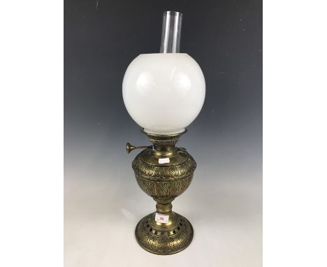 A brass oil lamp, 56 cm