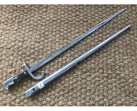 A French Ml2 1874 bayonet, electroplated and finely engraved with the name J Park, Carlisle on the pommel and scabbard, the s