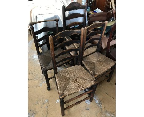 Four late 18th / early 19th Century rush-seated ladder back chairs