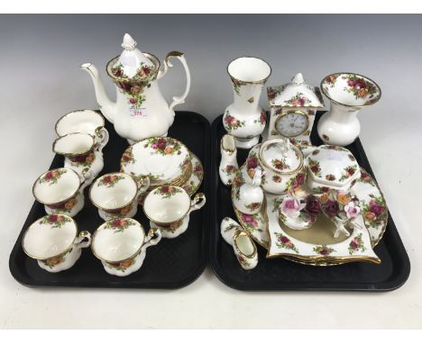 A collection of Royal Albert Old Country Roses pattern china, including a part coffee set, a mantle clock and trinkets 