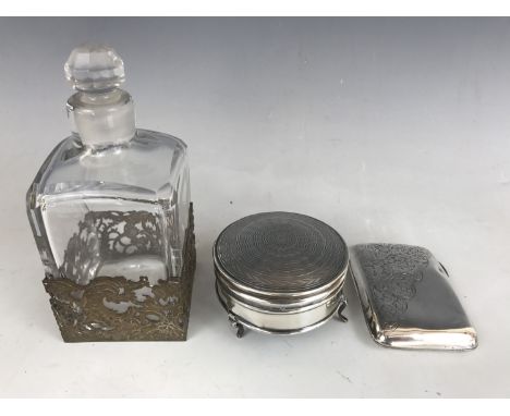 A George V silver ring box, of circular section, with an engine turned cover, together with a George V silver cigarette case,