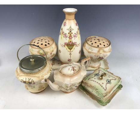 A quantity of Crown Ducal and Crown Devon blush ivory wares including a dressing table tray, a teapot, a vase and a pair of p