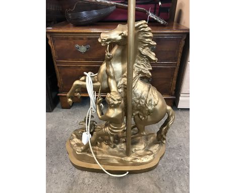A large gilded figural table lamp modelled as a Marley horse