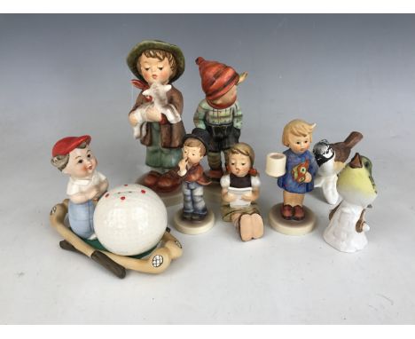 Five Goebel figurines together with two Goebel bird figurines and a novelty golf themed cruet