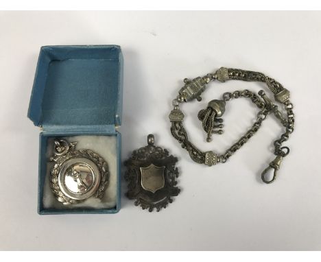 A Victorian nickel Albertina watch chain, together with a silver fob medallion with shield-shaped vacant cartouche, 12g, and 