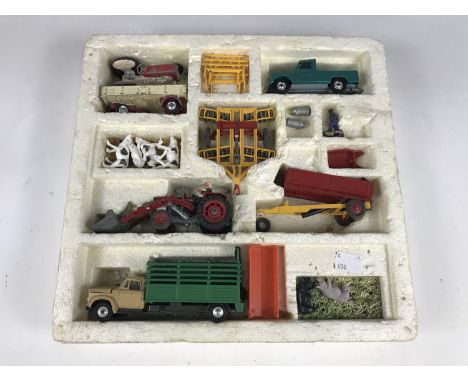 A Corgi Toys Agricultural Gift Set No. 5, including a Massey Ferguson 165 Tractor with shovel, in original polystyrene packag