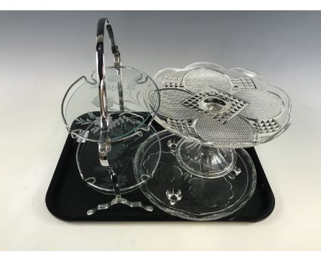 A vintage wheel-cut glass and electroplate cake stand, together with a pressed glass tazza, and cake plate 
