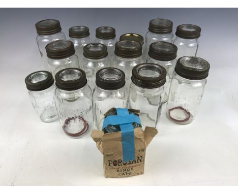 A number of vintage glass Kilner preserving jars 