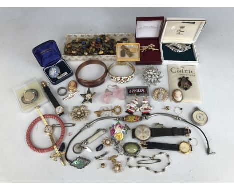 A large quantity of vintage and other costume jewellery and watches