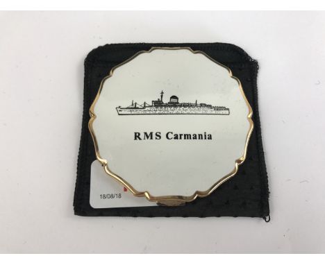 A vintage Stratton powder compact having a "RMS Carmania" cover