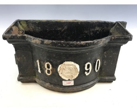 A late Victorian cast-iron hopper bearing the date 1890, 49 x 21 cm high 