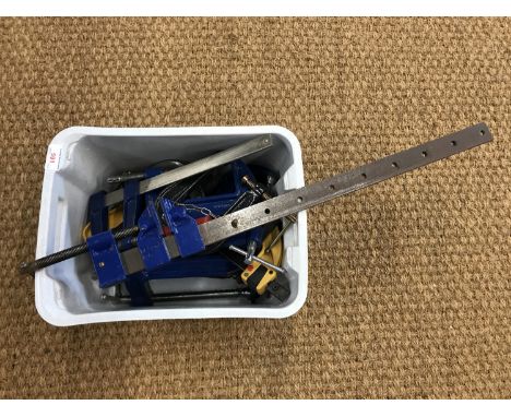 A quantity of G-clamps and a sash clamp