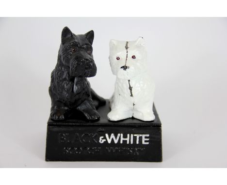 A Black & White Scotch Whisky cast metal advertising group of two terriers, 15.5cm