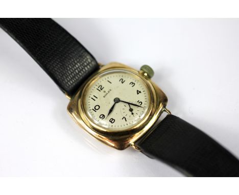 A Gentleman's gold Rolex wristwatch, the cushion shaped case with circular dial and Arabic numerals, subsidiary seconds dial,
