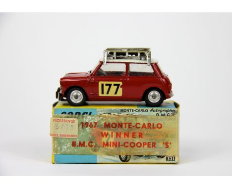 A Corgi 339 BMC Mini Cooper 'S', Monte Carlo 1967, red body, white roof R.N 177, roof rack with two spare wheels, in a 321 bo